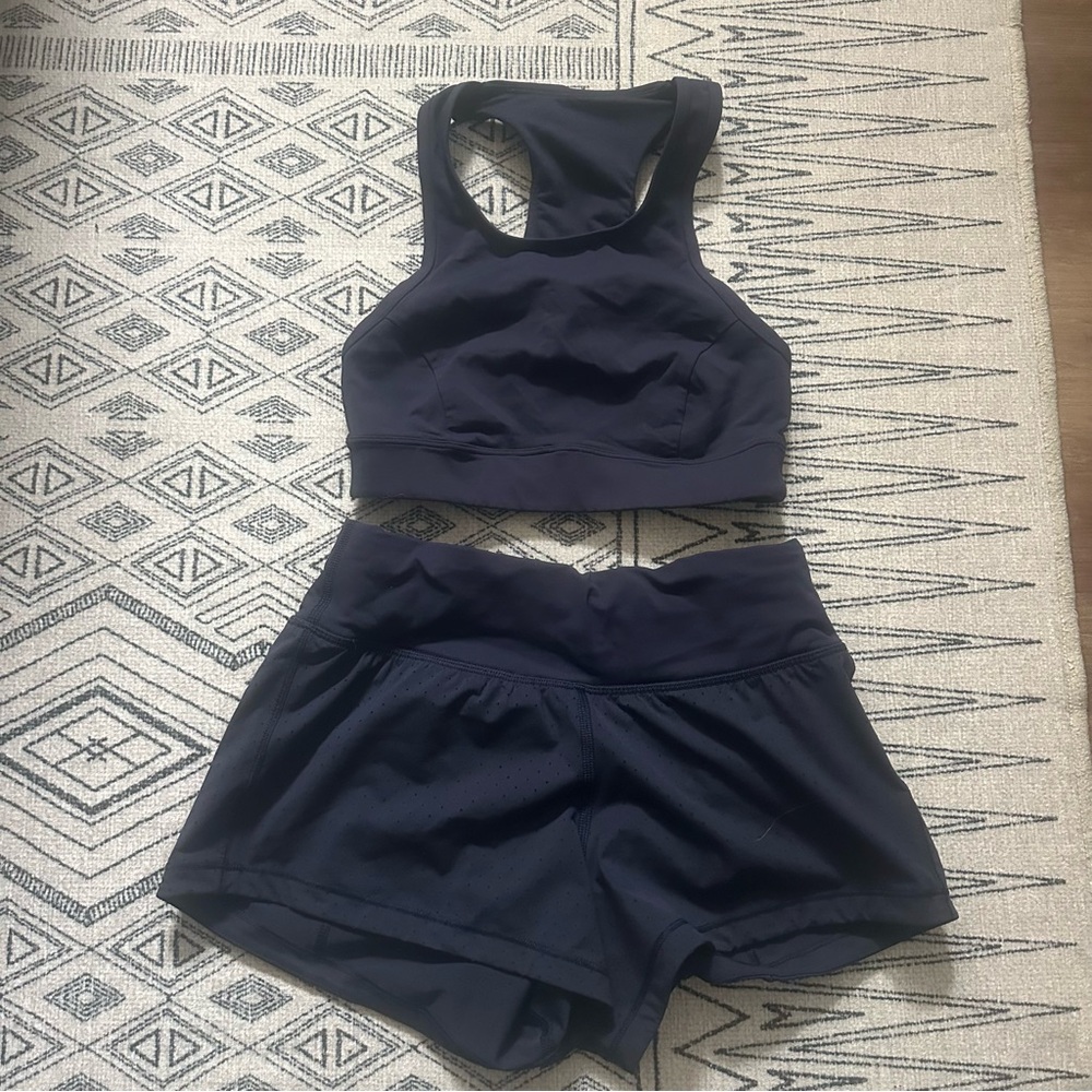 Dark blue Lululemon sportswear set shorts and top